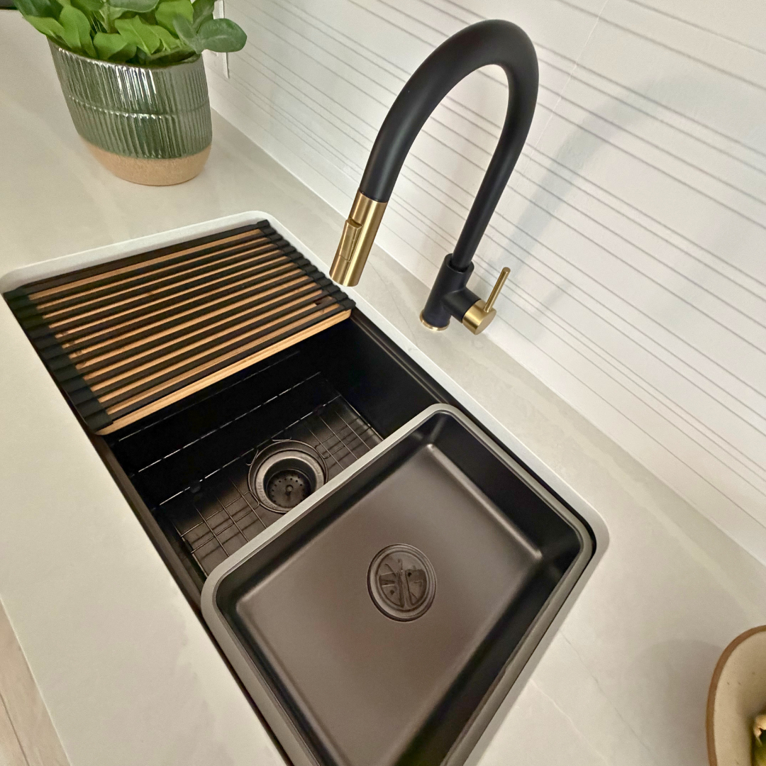 Kitchen sink and faucet polished to a shine