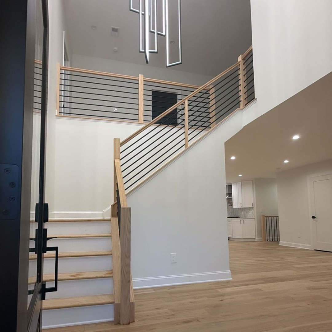 Entryway and staircase dusted and vacuumed
